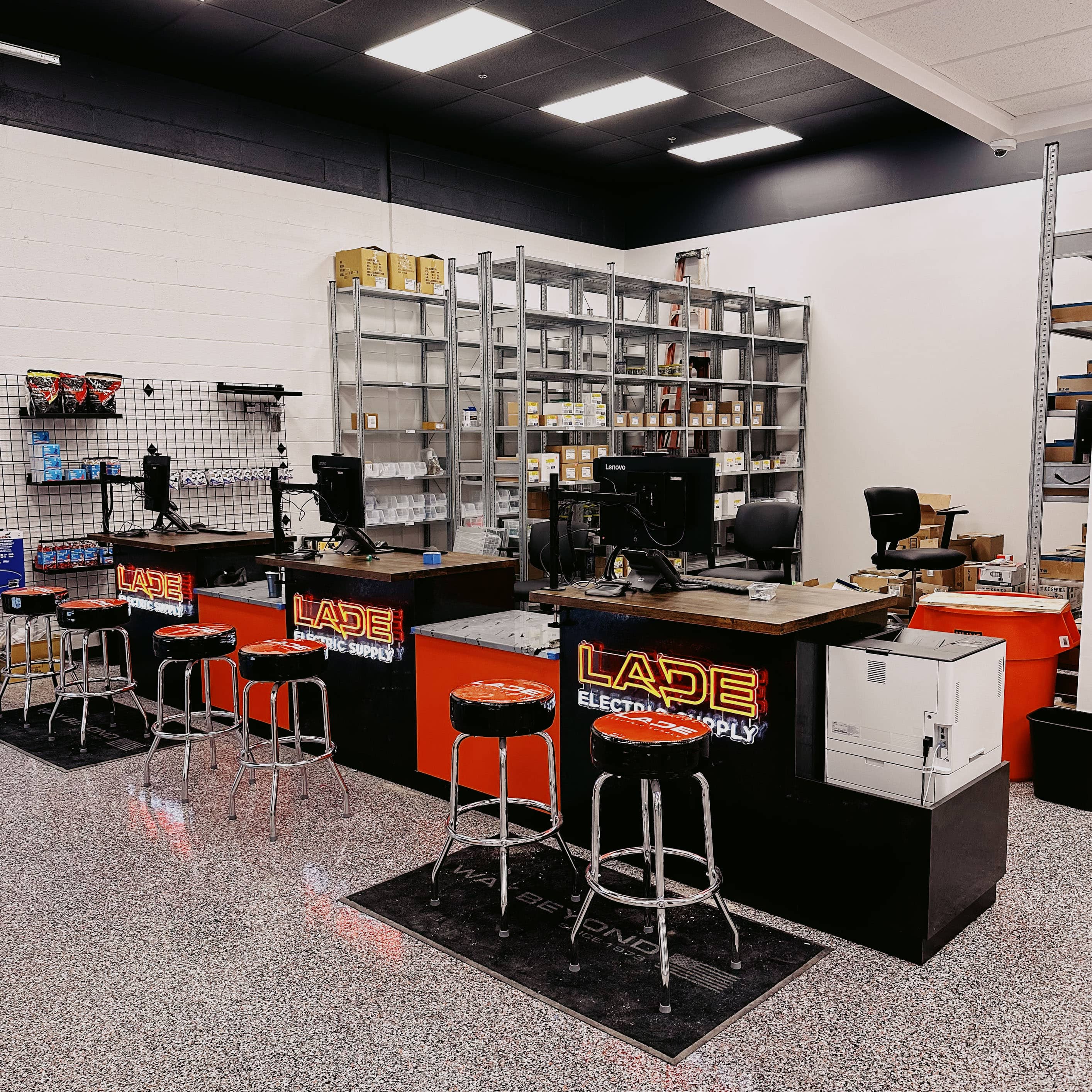 Commercial office cabinetry with branded reception counters and workstations by GM Cabinetry in Georgia